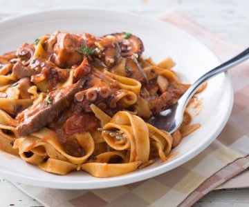 Fettuccine pasta with octopus and porcini mushroom sauce