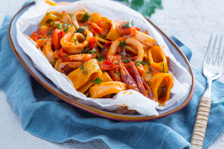 Calamarata (Pasta with calamari and tomato sauce)