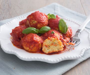 Ricotta cheese fried balls with sauce
