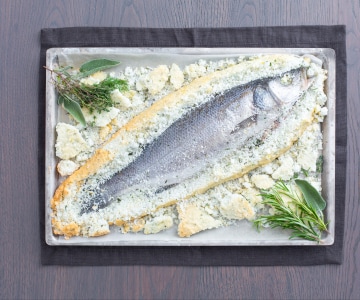 Sea bass in a herb salt crust