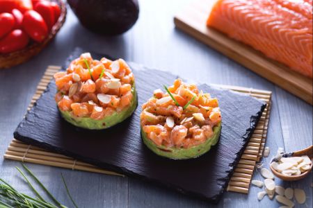 salmon tartare with avocado and toasted almonds