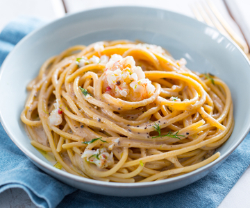 Cacio e pepe spaghetti with shrimps