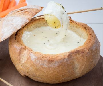Cheese fondue bread bowl
