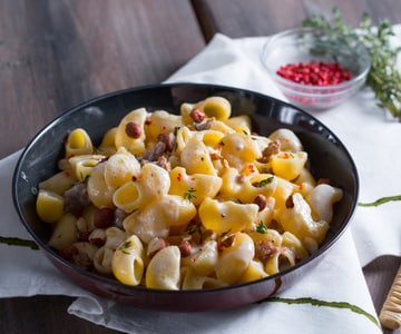 Pasta with sausage and parmigiano cream