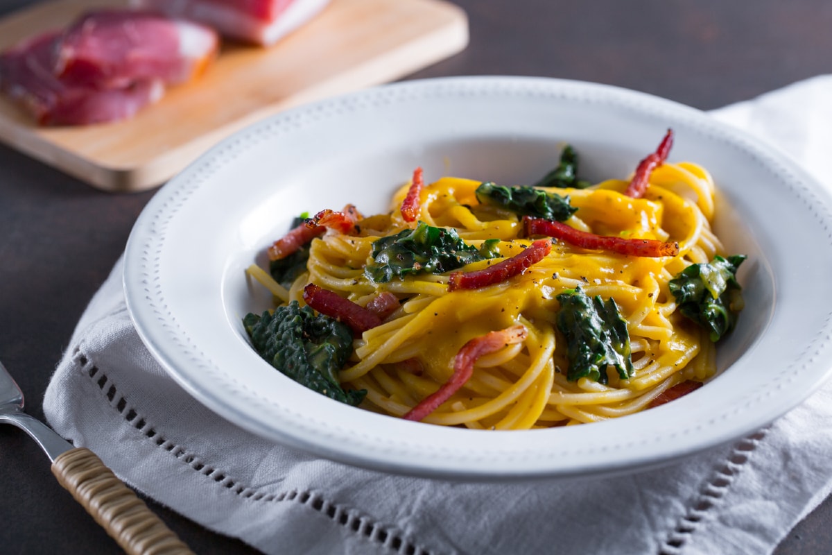 Pasta with delicata squash cream and black cabbage