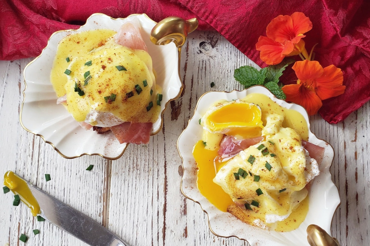 Eggs Benedict with passion fruit hollandaise