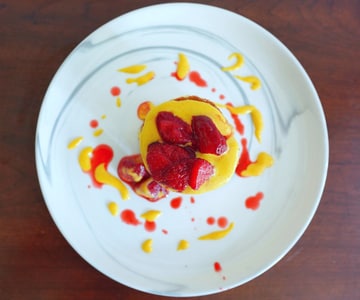 Olive oil cake with strawberry and zabaglione