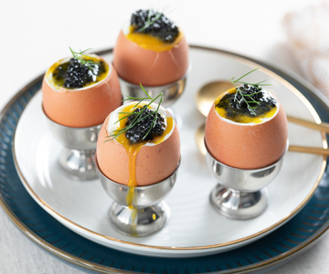 Soft-boiled eggs with caviar