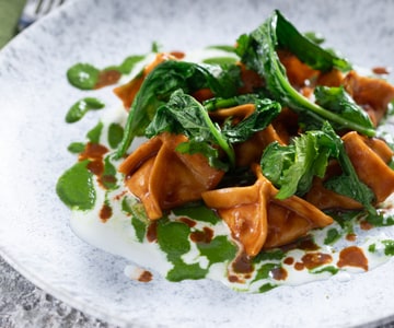 Shrimp Stuffed Ravioli with Stracciatella Cheese and Broccoli Rabe