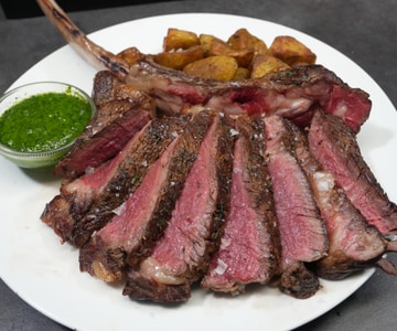 Beef Tomahawk Steak with Baked Potatoes