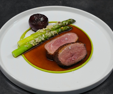 Duck Breast with Asparagus, Pea Puree and Orange Sauce
