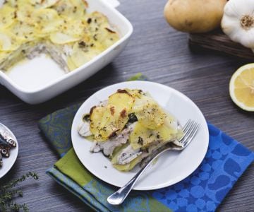 Baking dish of anchovies and potatoes