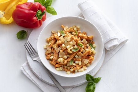Cold pasta with bell pepper pesto and caciocavallo cheese