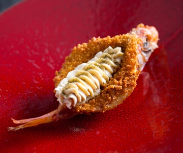 Fried red mullets with anchovy butter