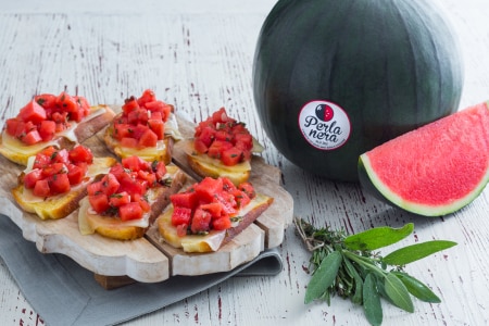 Crostino with marinated watermelon and cheese