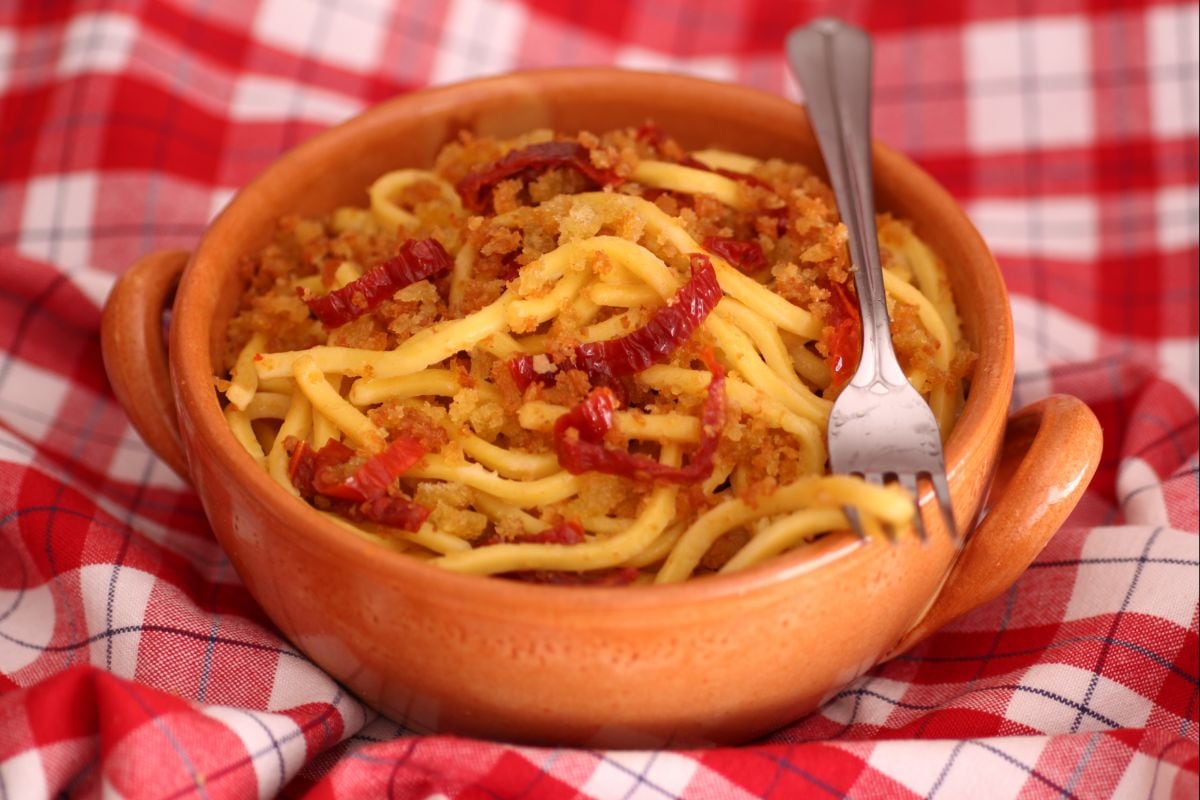 Troccoli with dried tomatoes, anchovies, and crunchy bread crumbs
