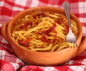 Troccoli with dried tomatoes, anchovies, and crunchy bread crumbs