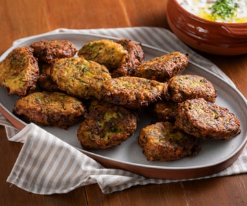 Zucchini and feta fritters with yogurt sauce