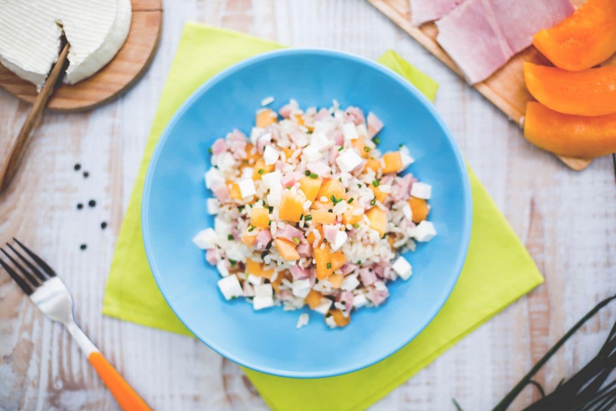Rice salad with ham and melon