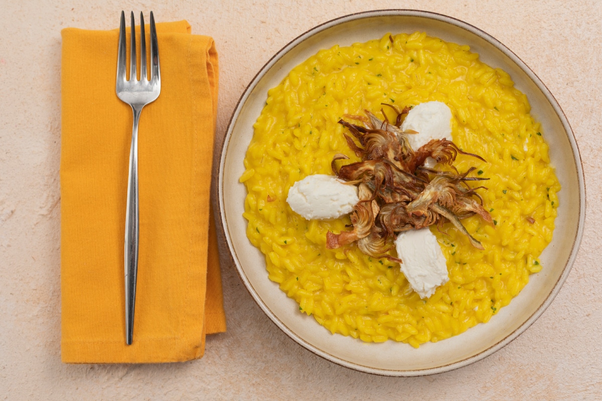 Saffron risotto with artichokes and goat cheese