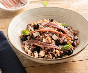 Farro salad with primosale cheese, blackberries, and anchovies