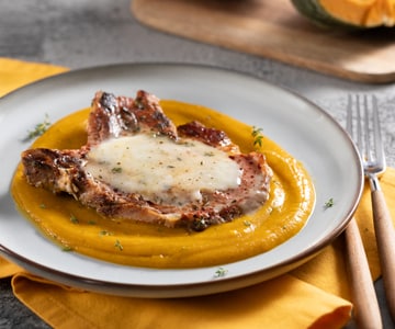Pork chops with pumpkin cream and taleggio