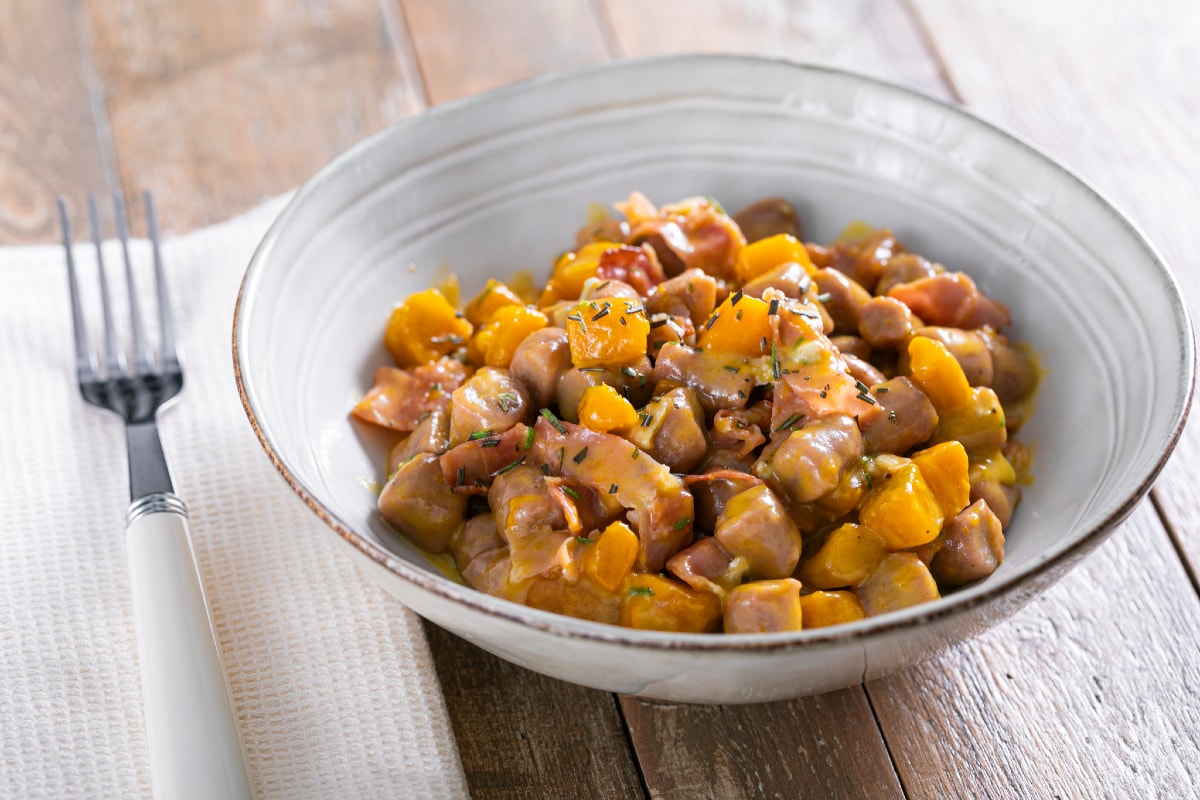Chestnut gnocchi with pumpkin and speck