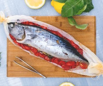 Bonito en papillote with cherry tomatoes