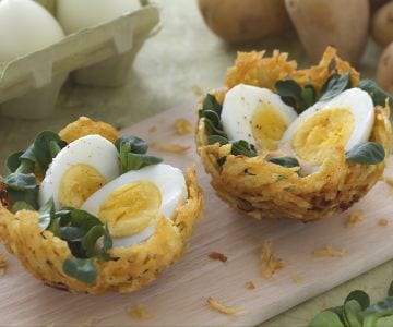 Potato nests with eggs