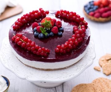 Yogurt cake with strawberry jelly and berries