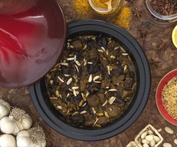 Lamb tagine with plums and almonds