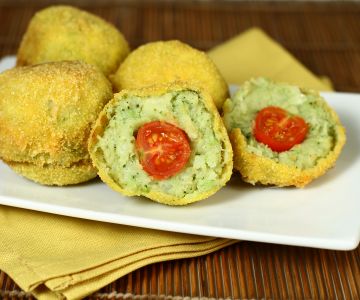 Potato and broccoli croquettes with cherry tomato heart