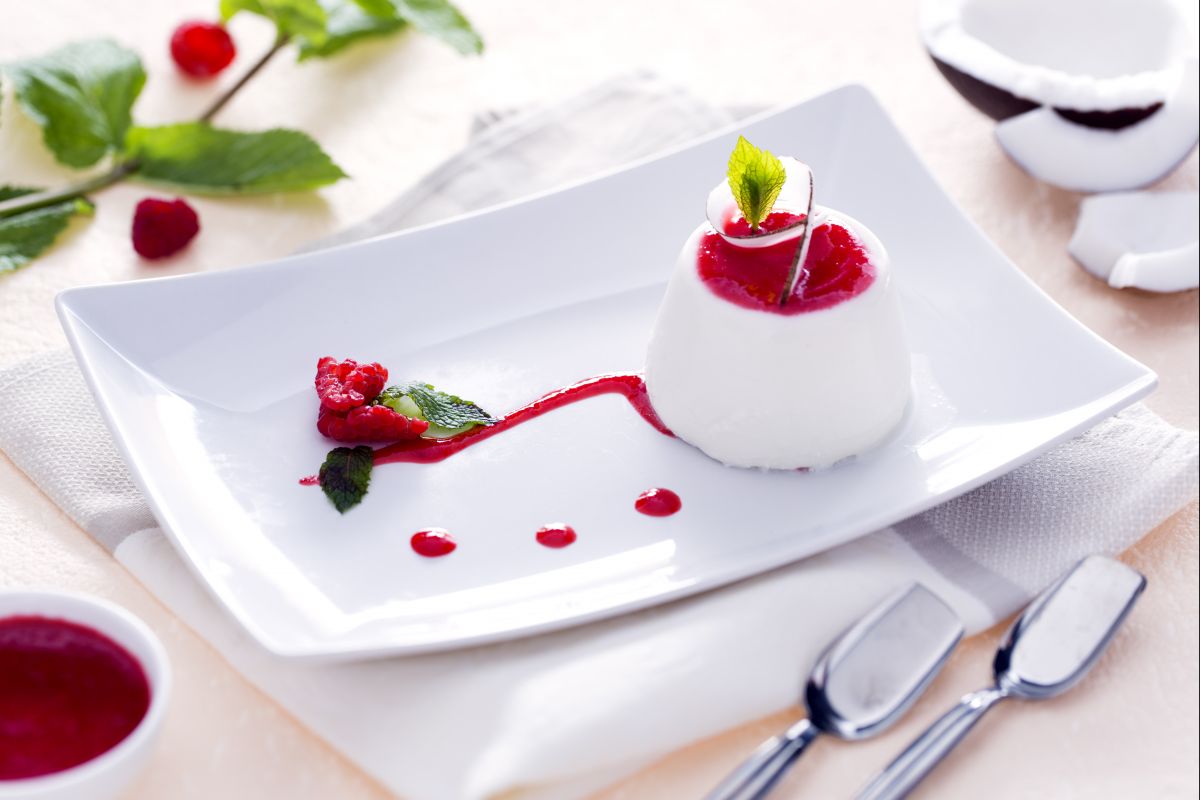 Coconut panna cotta with raspberry coulis