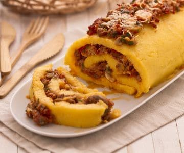 Polenta roll with sausage and mushrooms