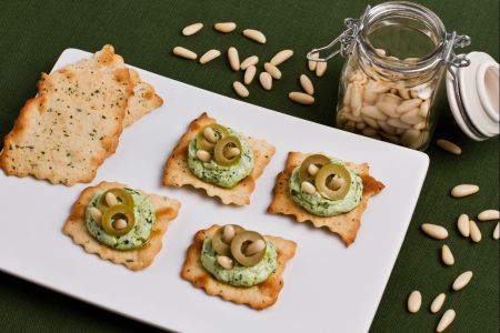 Olive puff pastries with pesto and ricotta