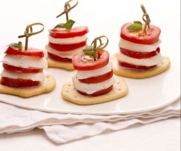 Caprese tower on crushed bread