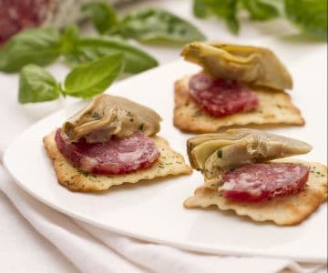 Artichokes and Salami on Olive Crackers