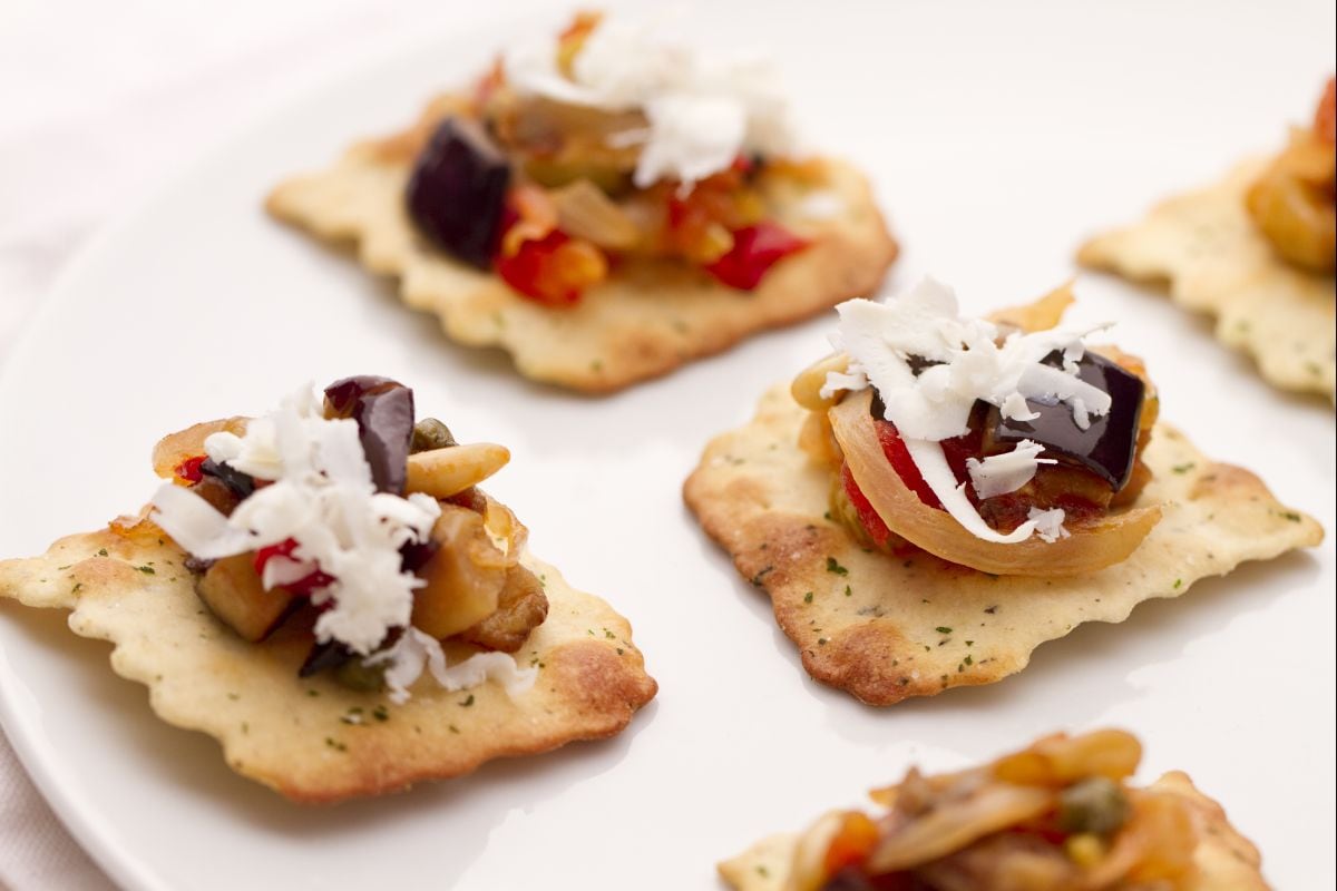 Caponata on olive sheets