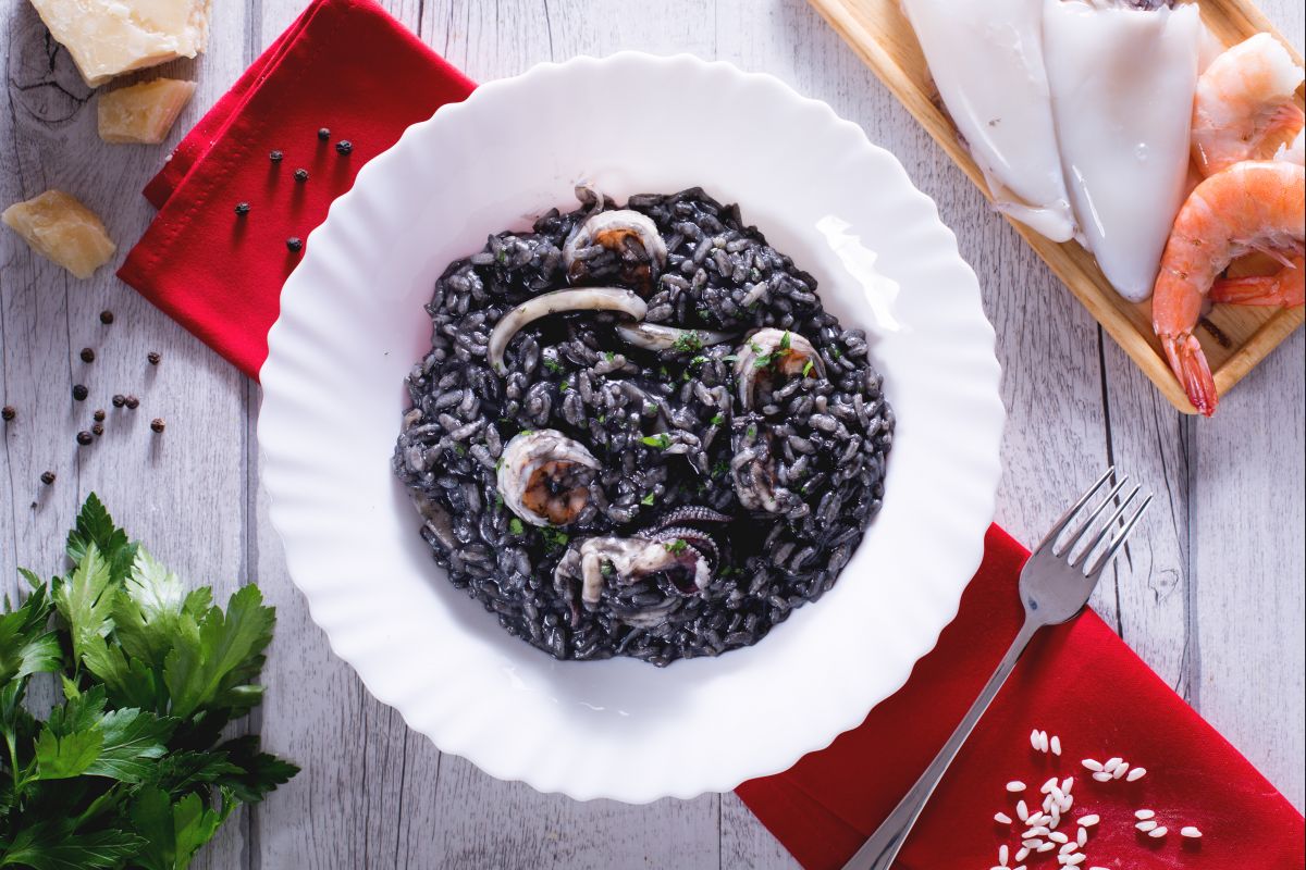 Squid ink risotto with shrimp