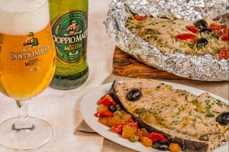 Beer-baked swordfish with cherry tomatoes and olives