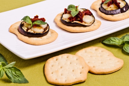 Flatbreads with eggplant, scamorza cheese, and sun-dried tomatoes