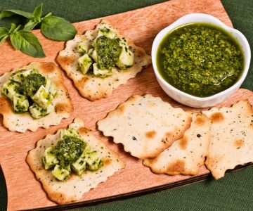 Olive puff pastries with green chicken salad