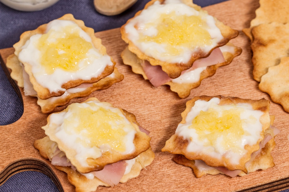 Croque monsieur finger food with classic puff pastry