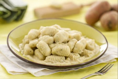 Herb gnocchi with leek cream