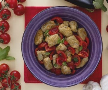 Eggplant gnocchi with cherry tomatoes and basil
