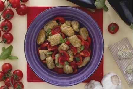 Eggplant gnocchi with cherry tomatoes and basil