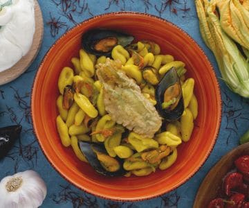 Cavatelli with zucchini flowers, mussels, and saffron