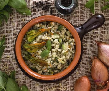 Barley risotto with zucchini and zucchini flowers