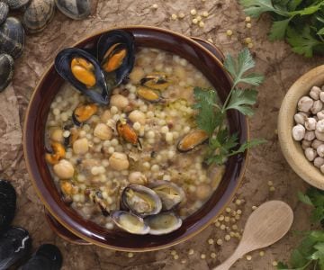 Fregola with mussels, clams and chickpeas
