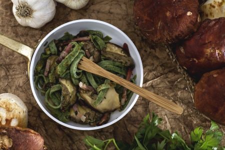 Green omelette tagliatelle with mushrooms and speck